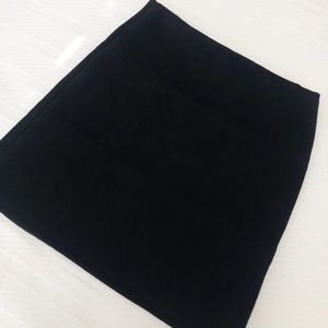 Black suede mini skirt